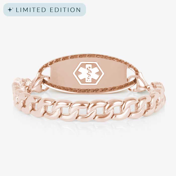 Women's rose gold medical alert bracelet featuring a bold curb chain and blank medical ID tag with a subtle hexagon overlay showcasing the caduceus symbol.