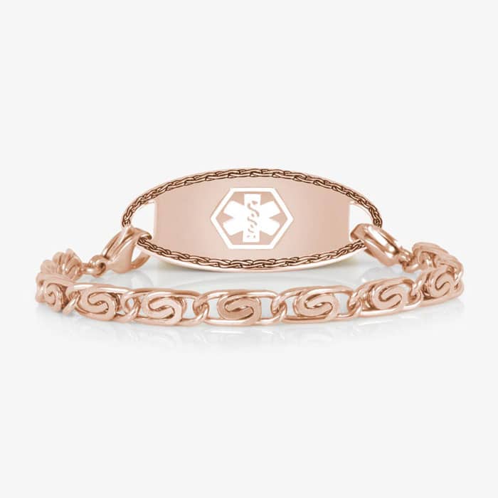 Rose gold medical ID bracelet with decorative swirl links and engraved medical emblem, combining elegant jewelry with safety.