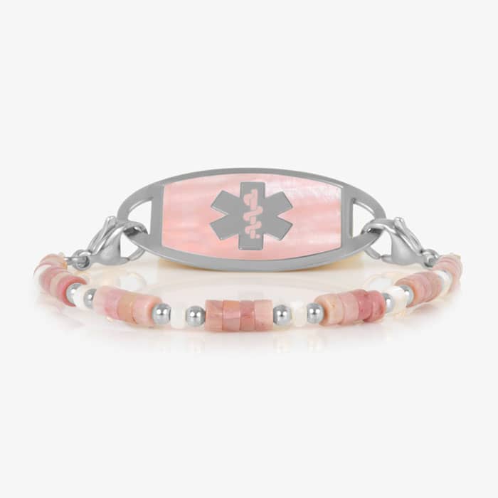 Beaded bracelet featuring Silver tone and Heishi beads in cream and rose on a stretch bracelet, attached to a Silver tone medical ID with a Silver tone medical ID tag with Pink Mother of Pearl id and Silver tone caduceus medical symbol. 