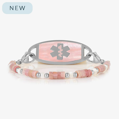 Beaded bracelet featuring Silver tone and Heishi beads in cream and rose on a stretch bracelet, attached to a Silver tone medical ID with a Silver tone medical ID tag with Pink Mother of Pearl id and Silver tone caduceus medical symbol. 
