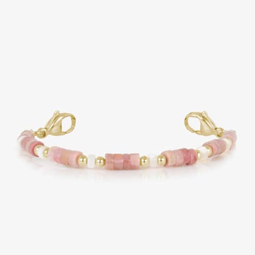 Beaded bracelet featuring gold tone, and Heishi beads in Cream and Rose on a stretch bracelet.