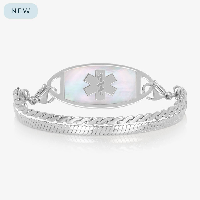 Silver medical ID bracelet with iridescent mother of pearl inlay tag and classic chain links on white background.