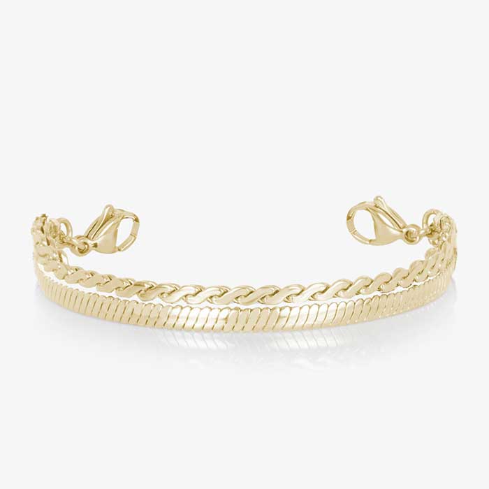 Gold medical ID bracelet with iridescent mother of pearl inlay tag and layered chain links on white background.