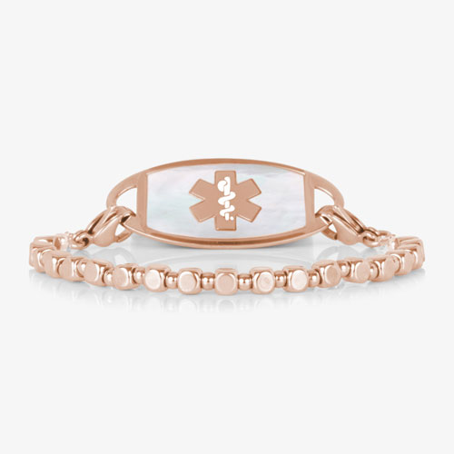 Front view of the Facet Rose interchangeable bracelet paired with a rose gold-tone medical ID tag featuring a white mother-of-pearl inlay.