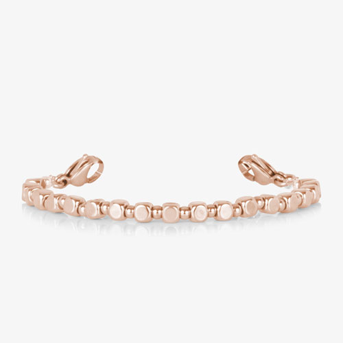 Facet Rose interchangeable bracelet featuring polished rose gold-tone faceted links with lobster clasps and a sleek, modern design.