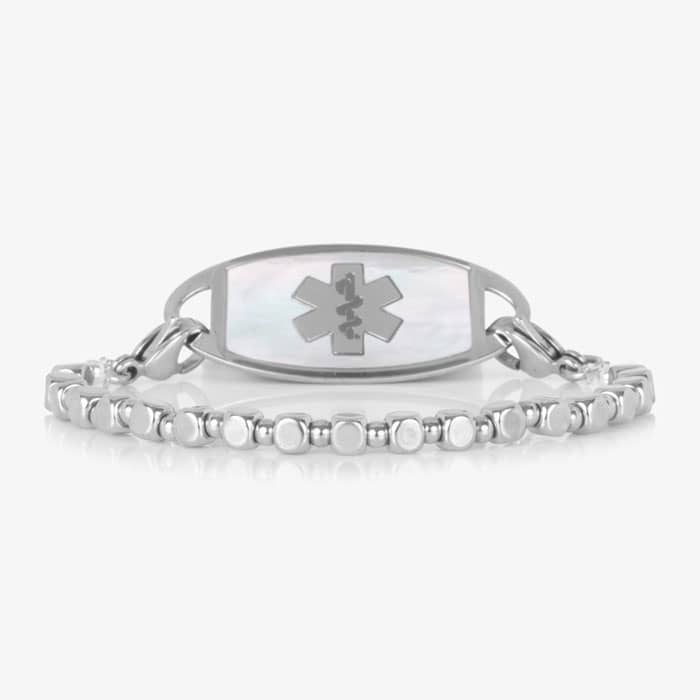 Front view of the Facet Silver interchangeable bracelet paired with a silver medical ID tag featuring an iridescent mother-of-pearl inlay.
