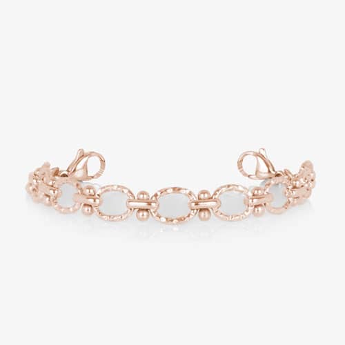 Rose gold-tone Iris interchangeable bracelet featuring textured oval links, bead accents, and lobster clasps for customizable wear.
