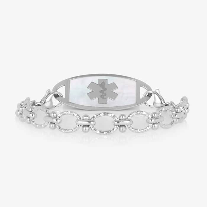 Silver-tone medical alert bracelet with a mother-of-pearl ID tag featuring the Star of Life symbol and elegant textured chain links.