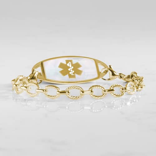 Gold-tone Ivy medical ID bracelet paired with a mother-of-pearl alert tag featuring a Star of Life symbol and secure clasp.