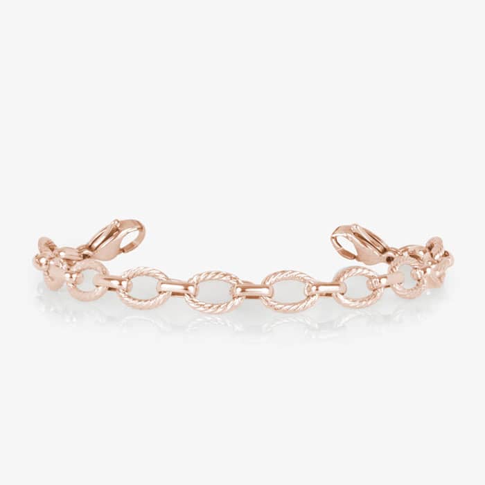 Rose gold medical ID bracelet with textured oval chain links and a mother-of-pearl alert tag featuring the Star of Life emblem.