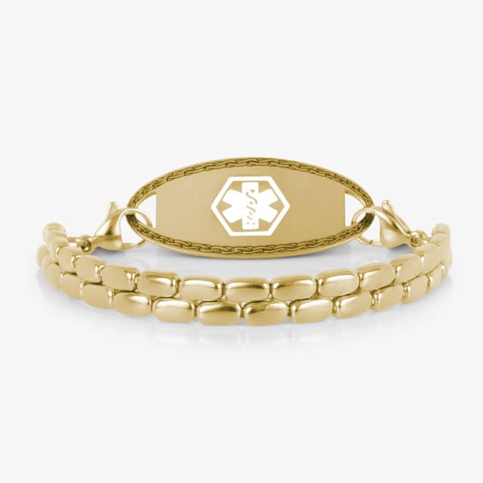 Gold-tone medical ID bracelet with a double-row rectangular link design and an oval ID tag featuring a white medical symbol.