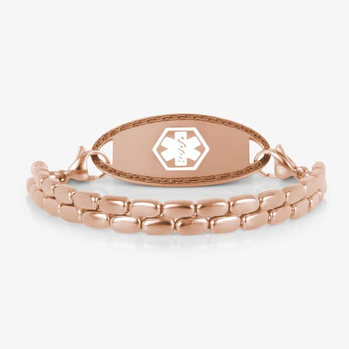 Rose gold-tone medical ID bracelet with a double-row rectangular link design and an oval ID tag featuring a white medical symbol.