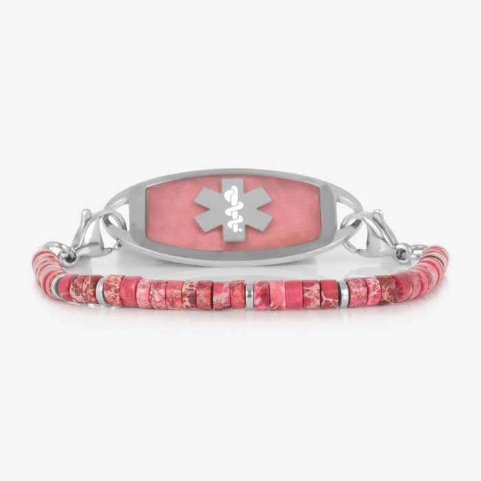 Silver-tone medical ID bracelet with pink jasper heishi beads, silver spacer accents, and a pink stone inlay ID tag featuring the Star of Life symbol.