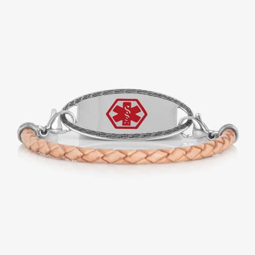 Light tan braided medical ID bracelet with a silver-tone oval tag, decorative border, and red medical symbol.
