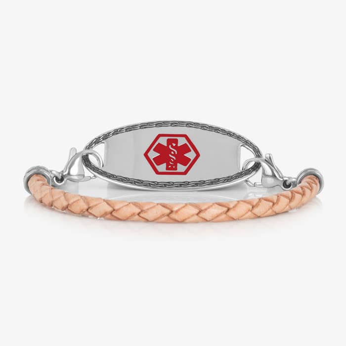 Light tan braided medical ID bracelet with a silver-tone oval tag, decorative border, and red medical symbol.