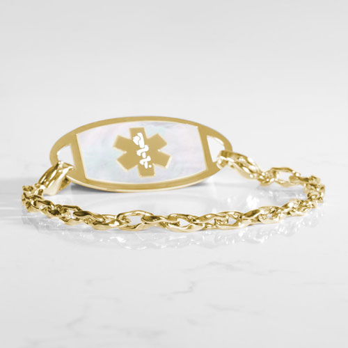 1. Gold-tone medical ID bracelet with interlocking chain links, light inlay, and a prominent medical symbol on the ID tag.