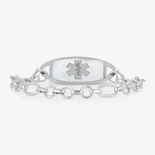 Silver-tone medical ID bracelet with a white inlay tag, medical symbol, and alternating round and oval links.