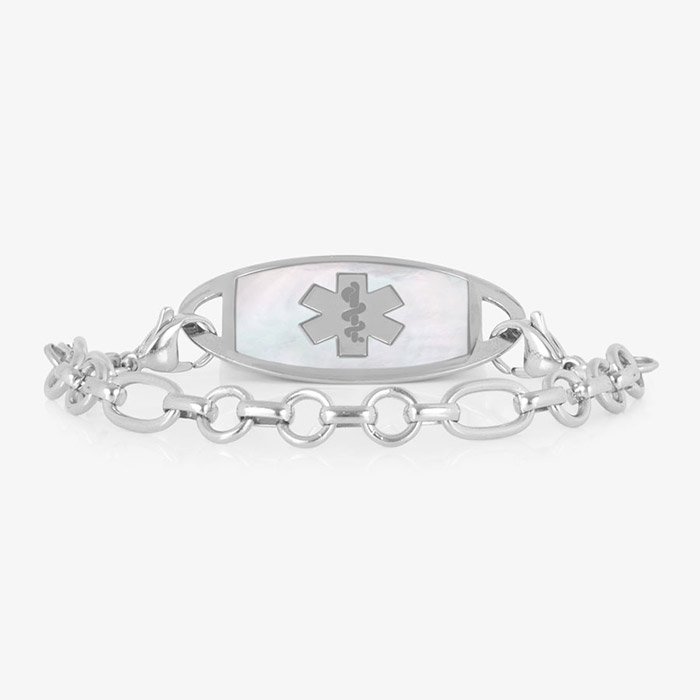 Silver-tone medical ID bracelet with a white inlay tag, medical symbol, and alternating round and oval links.