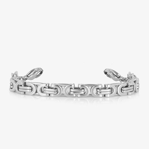Silver-tone bracelet with repeating geometric links and lobster clasps, shown without an ID tag.
