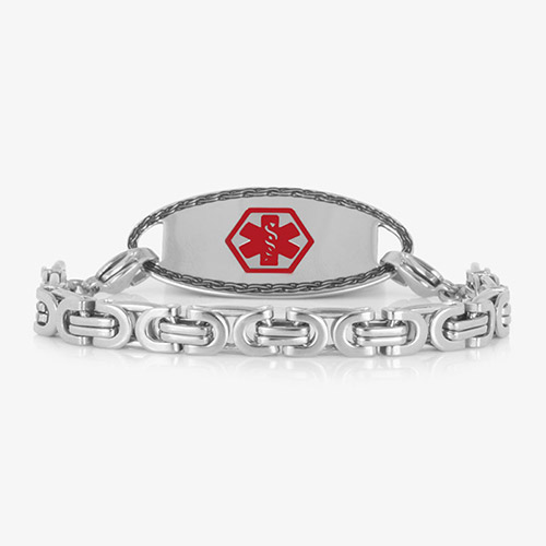 Silver-tone medical ID bracelet with bold geometric links and a red medical symbol on the ID tag.