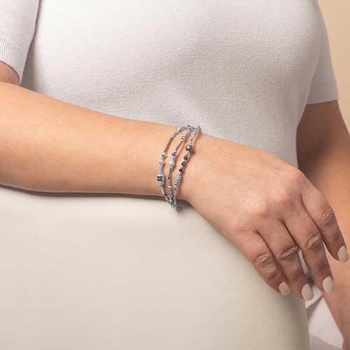 Woman wearing beaded medical alert bracelet with sterling silver beads and accents*