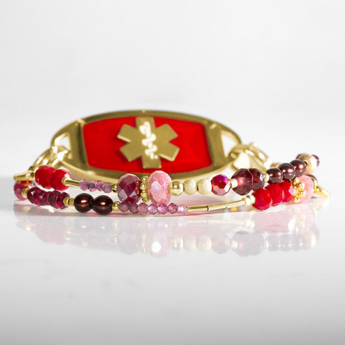 Ruby and garnet medical ID bracelet with gold accents and crimson red medical ID tag