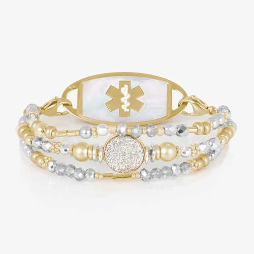 Mother-of-pearl medical ID tag with gold medical symbol, attached to dual-tone beaded bracelet.
