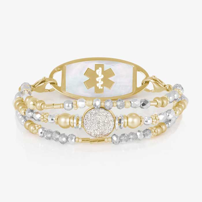 Mother-of-pearl medical ID tag with gold medical symbol, attached to dual-tone beaded bracelet.