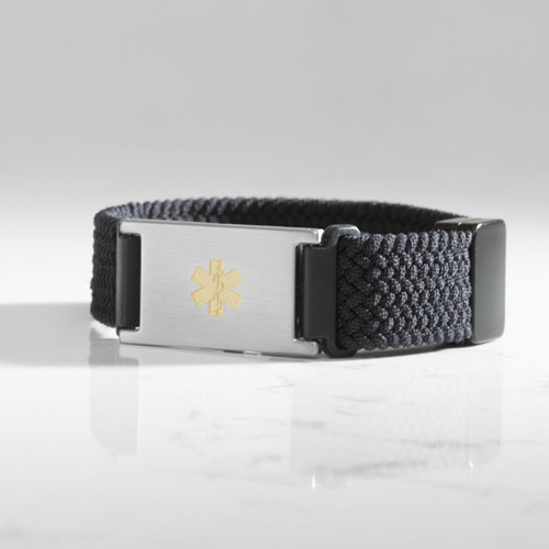 Urban Stretch Medical ID Bracelet in Black and Silver with woven and braided stretch band, featuring a gold medical caduceus symbol on marble