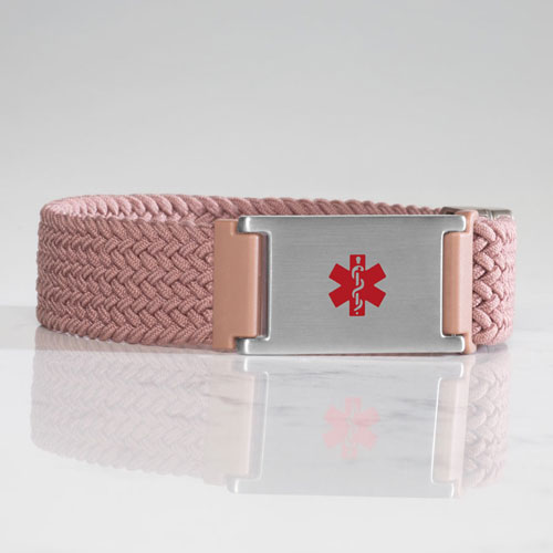 Urban Stretch Medical ID Bracelet with red medical symbol on marble backdrop
