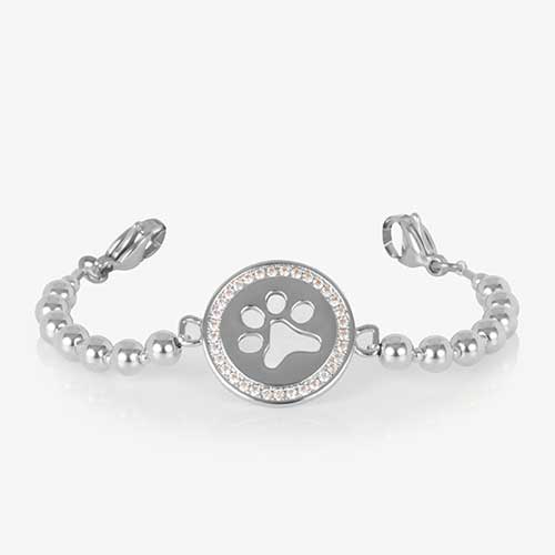 Silver stretch medical alert bracelet strand featuring a round paw print charm surrounded by clear crystals; shown without an ID tag.