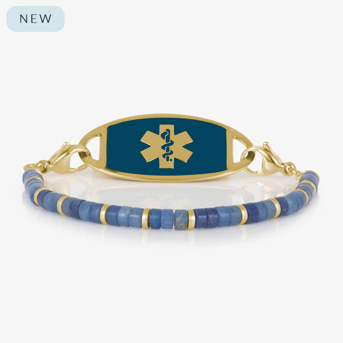 Denim-blue aventurine beaded medical ID bracelet with gold-tone spacers, attached to a gold medical ID tag featuring a navy face and gold medical symbol.