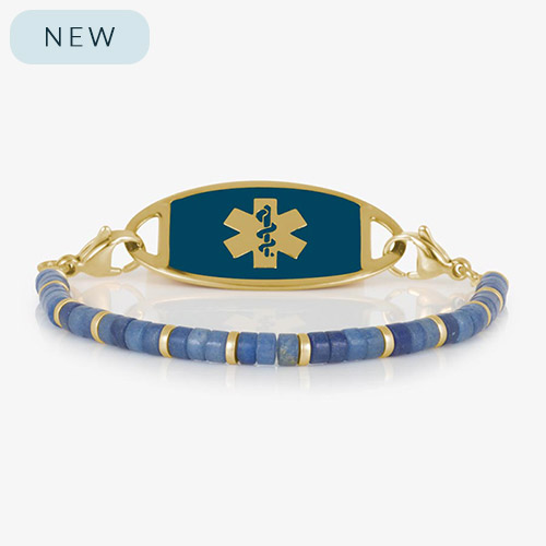 Denim-blue aventurine beaded medical ID bracelet with gold-tone spacers, attached to a gold medical ID tag featuring a navy face and gold medical symbol.
