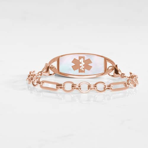 Classic rose tone chain in alternating link sizes and shapes which attaches to a tag using the 2 lobster clasps, displayed with a medical ID tag with a Rose tone medical symbol, and Mother of Pearl inlay.