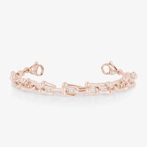 Rose gold-tone link bracelet with decorative barbell-style accents and lobster clasp closures.