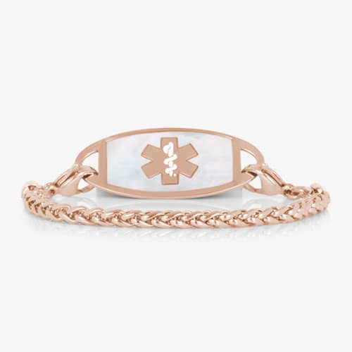 Rose gold wheat chain medical ID bracelet with a mother-of-pearl tag featuring the Star of Life.