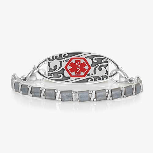 Slate blue tiled bracelet paired with a decorative silver-tone medical ID tag.
