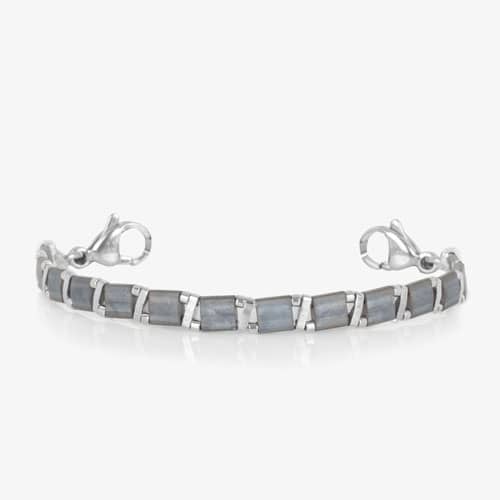 Slate blue tiled bracelet with silver-tone geometric accents and lobster clasps.