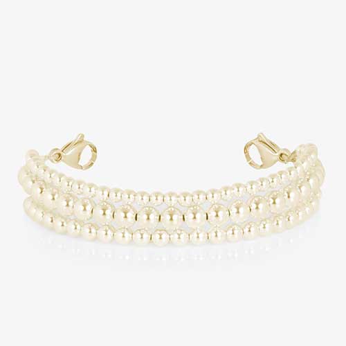 Gold Tilly three-strand beaded bracelet attachment with lobster clasps at each end.