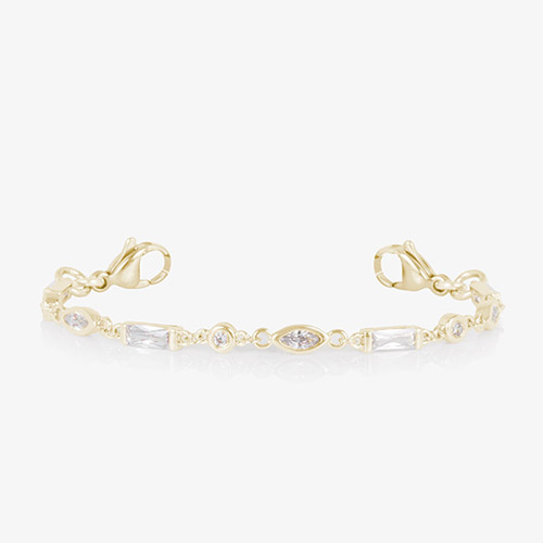 12 karat gold plated med ID tennis bracelet with round, oval, and rectangle clear cubic zirconia crystals and gold tone lobster clasps.