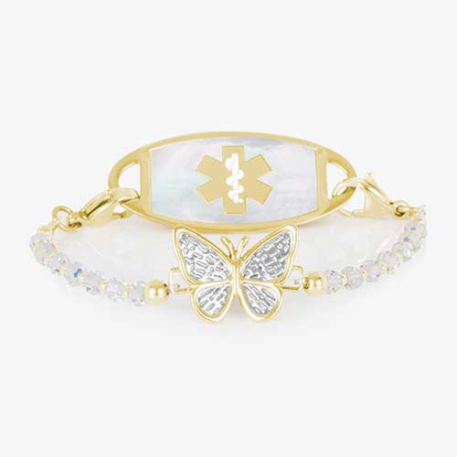 12k gold plated medical ID bracelet featuring iridescent beads surronding a gold plated butterfly centerpiece with decorative silver details, attached to a gold tone mother of pearl medical ID.