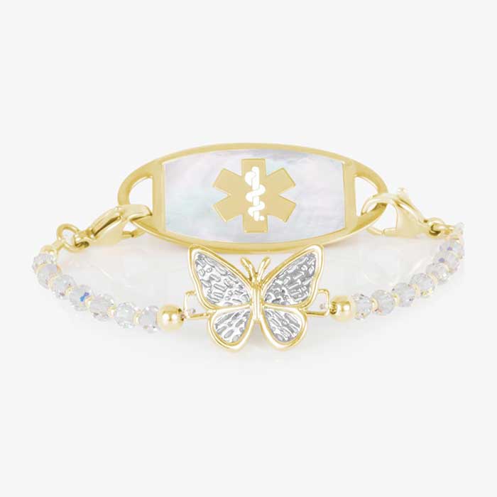 12k gold plated medical ID bracelet featuring iridescent beads surronding a gold plated butterfly centerpiece with decorative silver details, attached to a gold tone mother of pearl medical ID.