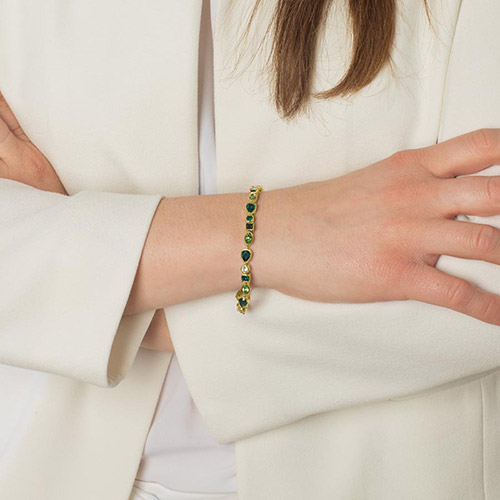 Interchangeable Kate Medical ID Bracelet in Emerald and 12k Gold Plate, featuring vibrant green cubic zirconia and mixable with other bracelets