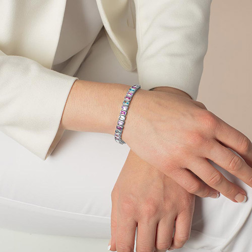 Monica Medical Alert Bracelet with pastel cubic zirconia stones in silver bezels, shown on wrist, combining style and function