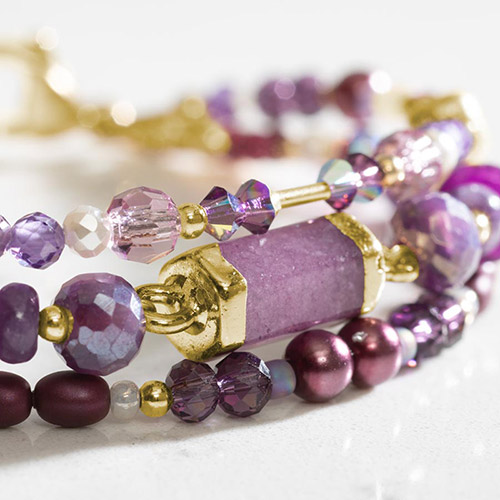 Close-up of bracelet details on Violet Medical Alert Bracelet, featuring amethyst, quartz, and purple jade barrel with gold accents