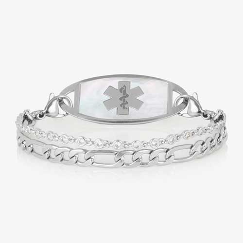 Silver toned two strand bracelet featuring a classic figaro chain, and a dainty, round CZ chain. All attached to a silver medical ID tag featuring inlaid Mother of Pearl and a silver caduceus.