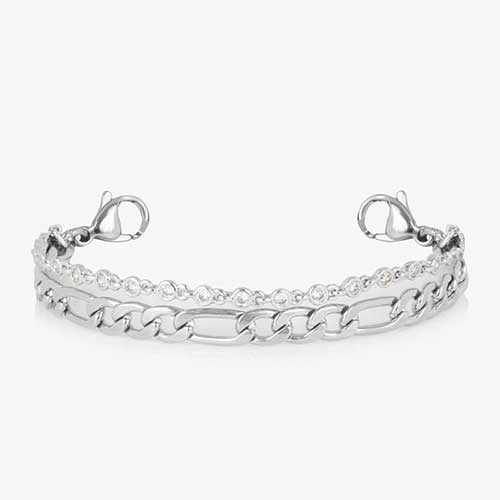 Silver toned two strand bracelet featuring a classic figaro chain, and a dainty, round CZ chain.