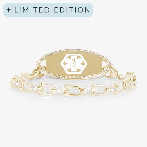 Women&#39;s medical alert bracelet with 14k gold-plated chain and clear CZ accents, paired with an engravable gold medical ID tag framed in CZs.