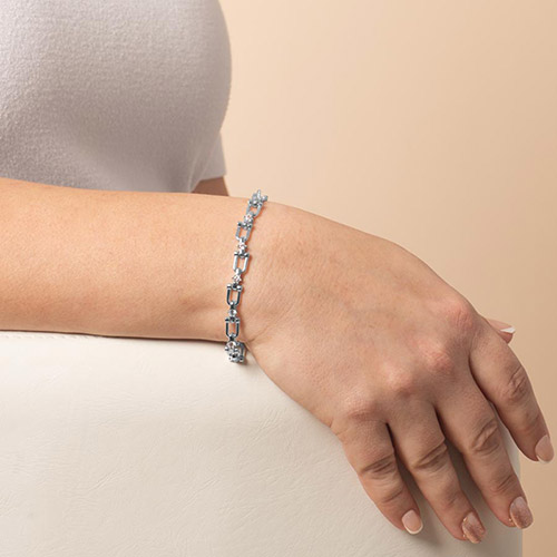 Lauren’s Hope silver medical ID bracelet with elegant crystal-accented links, shown on a model’s wrist for a sleek and sophisticated look.