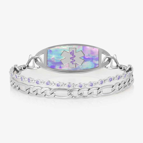 Women's medical ID bracelet with iridescent lavender opal inlay tag and light purple crystal accents on a double silver chain, engraved with the medical alert symbol.